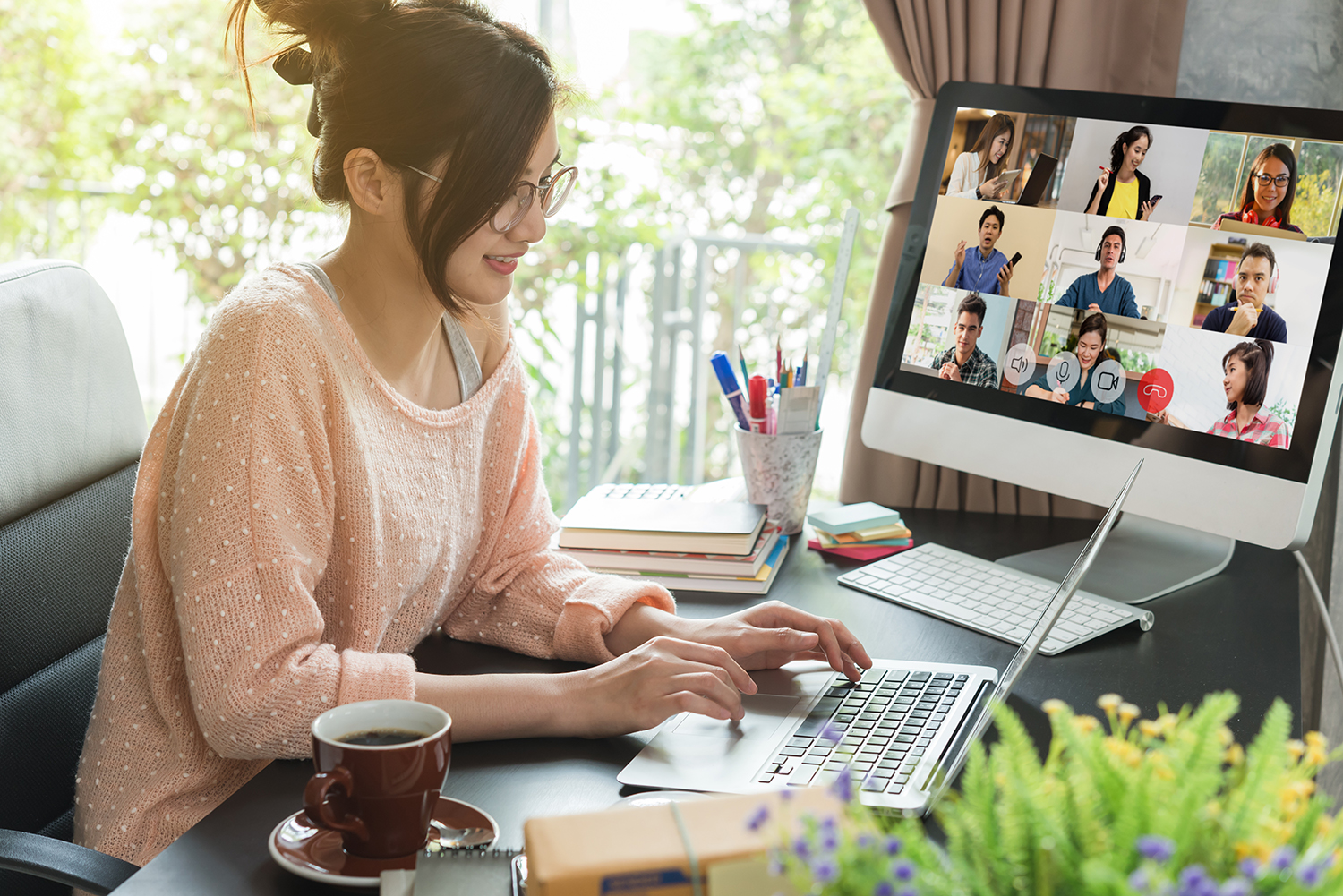 Asian woman work from home during corona virus, COVID-19 out break use laptop for teleconference with her teamates